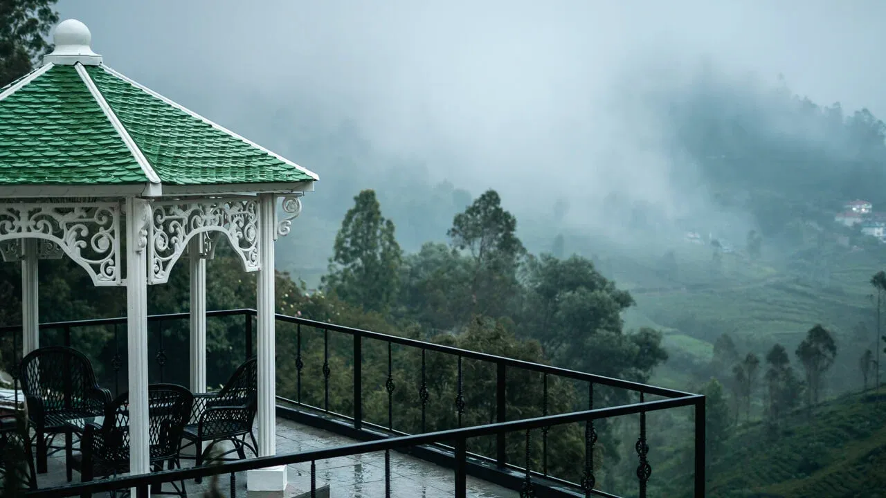Luxury tea estate villa surrounded by tea plantations in Coonoor